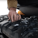 Madison Machinery Inc Grizzly™ Chains for Tracks | Skid Steer Rubber Track Traction System