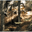 Madison Machinery Inc Over The Tire Tracks Chain Over-the-Tire Tracks (OTTs) for Skid Steers — Grizzly™